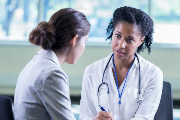 Doctor and female patient in a discussion